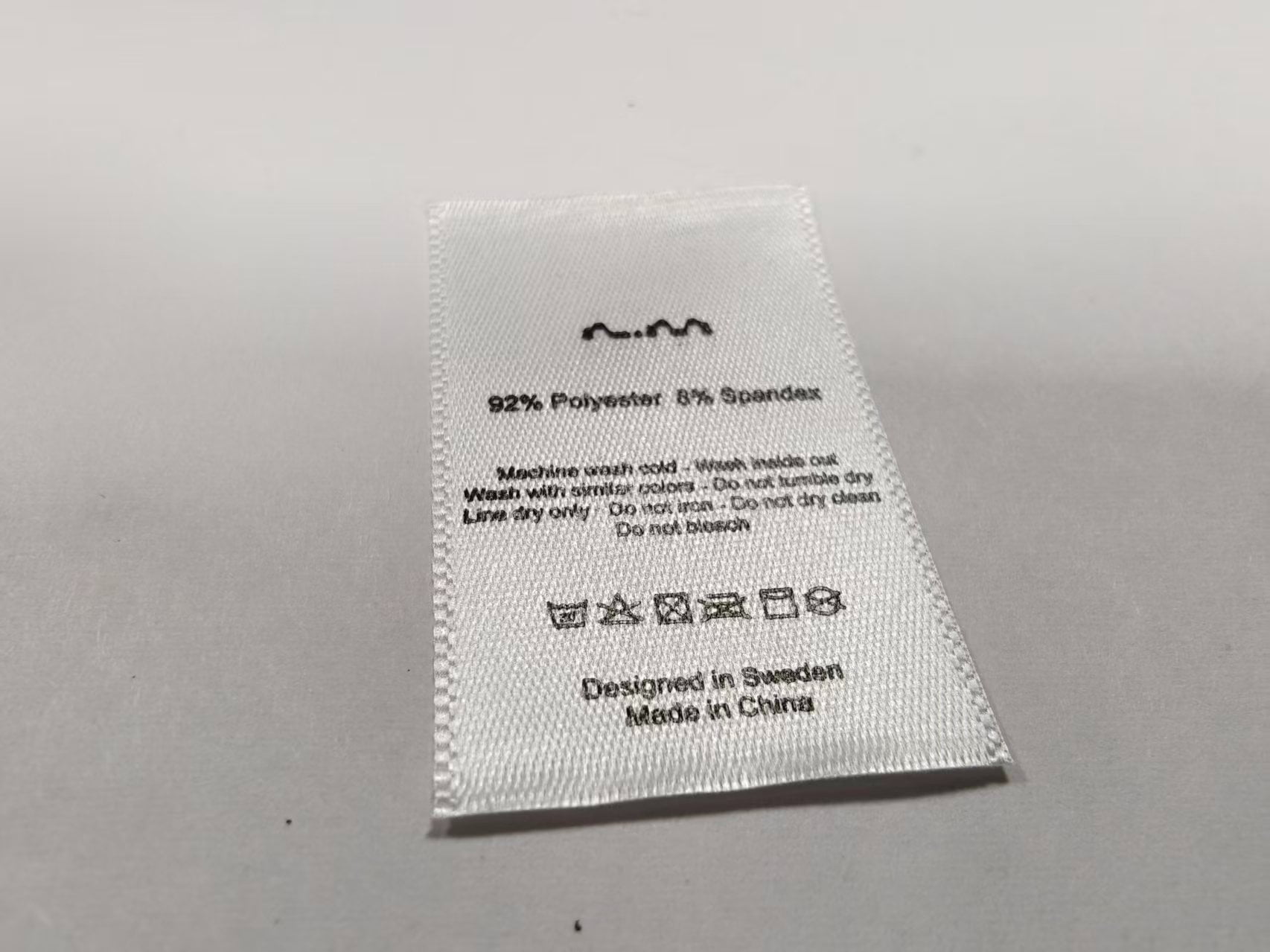 Fabric wash label customization